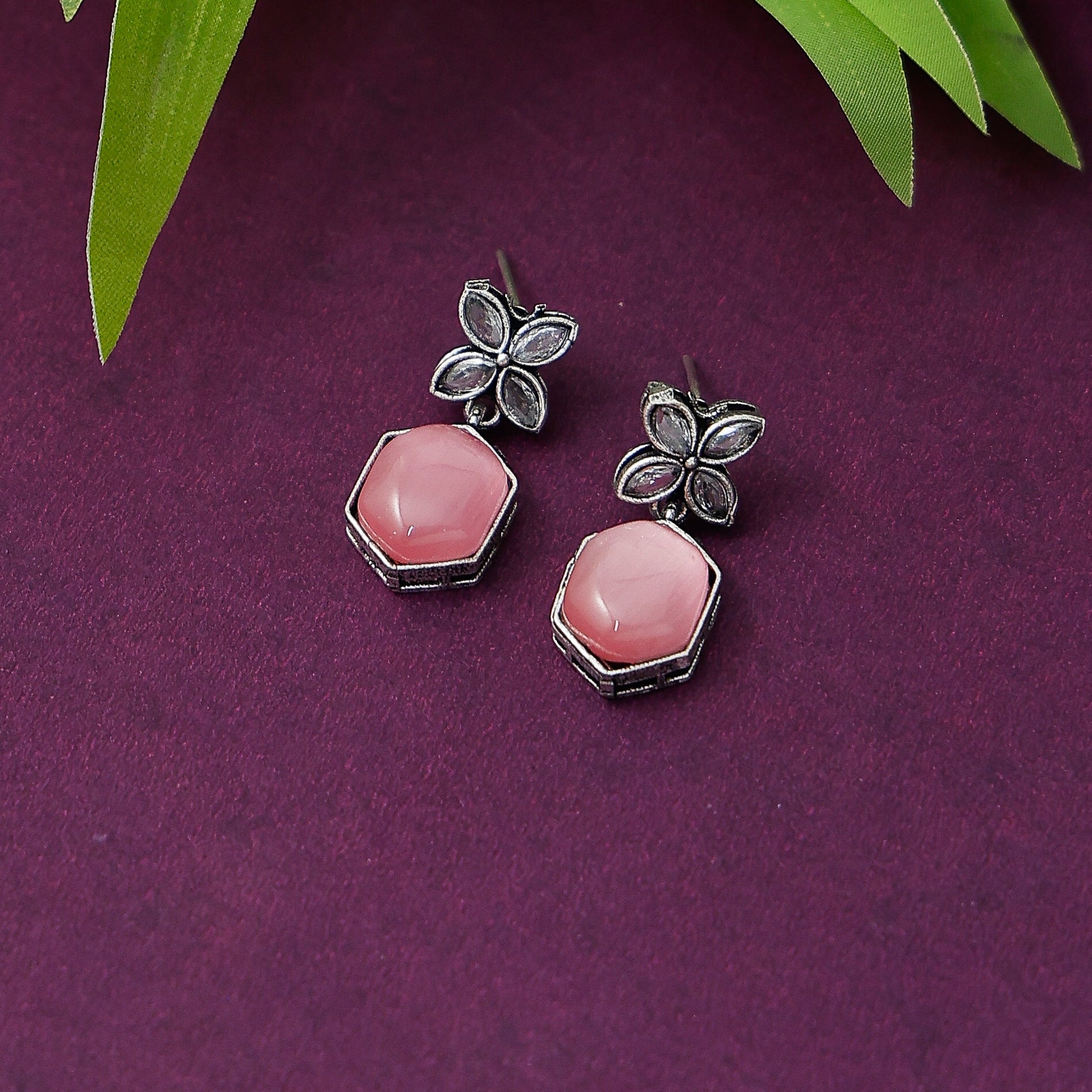 Sparkling stone earrings with hexagon design