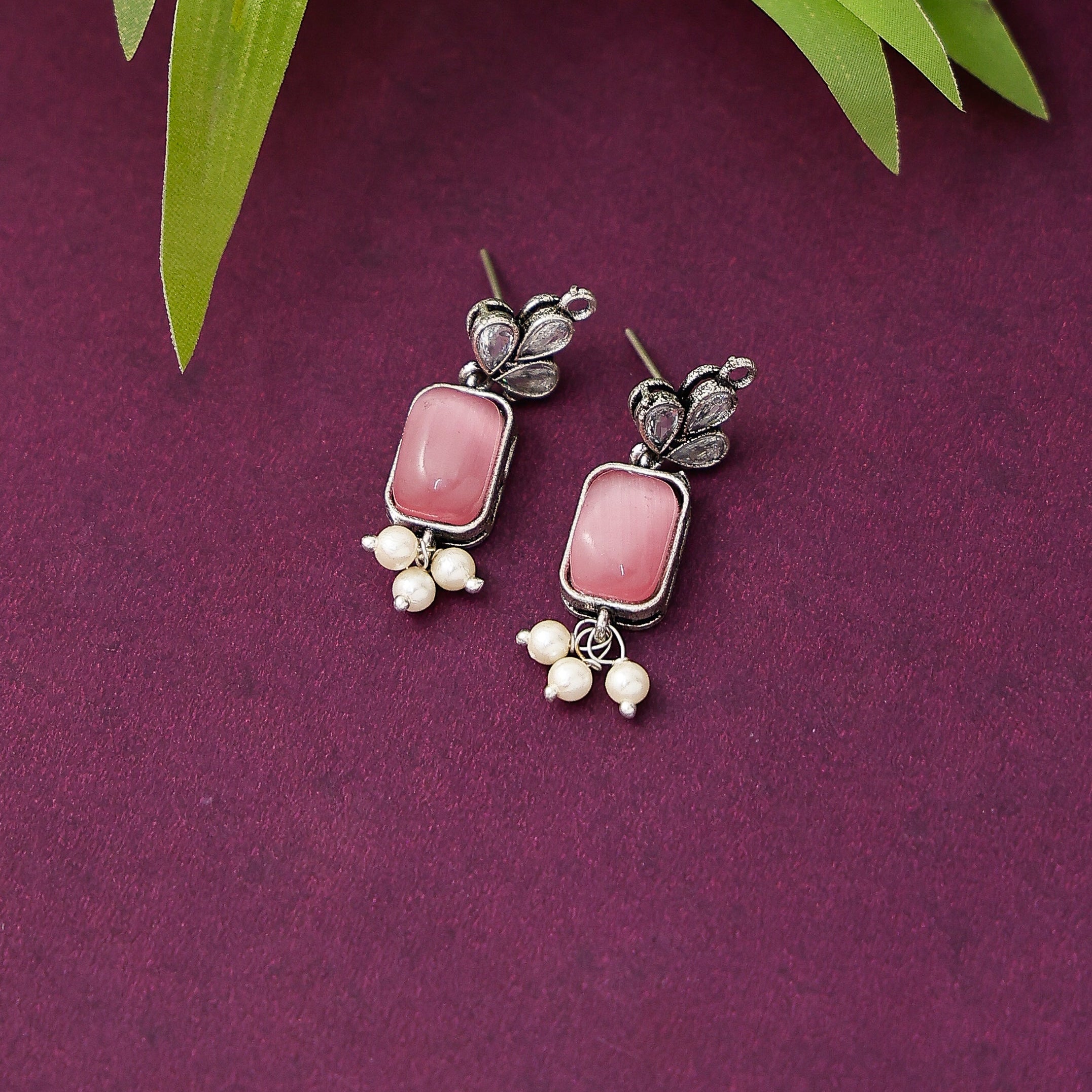 Stylish stone stud earrings with sparkling finish