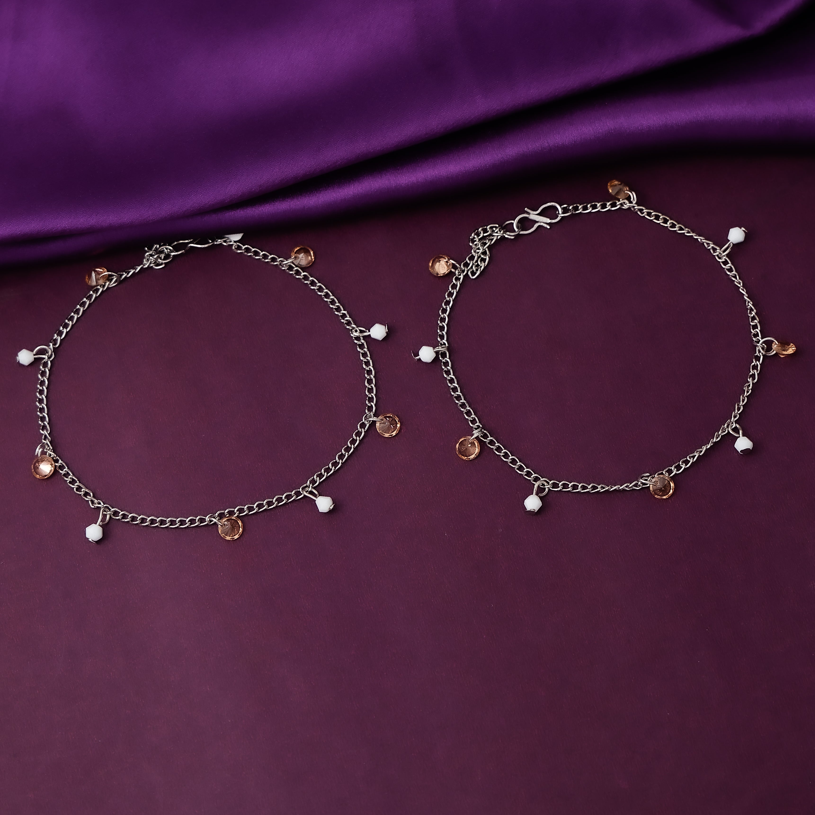 Elegant women’s anklet with silver beads and stones