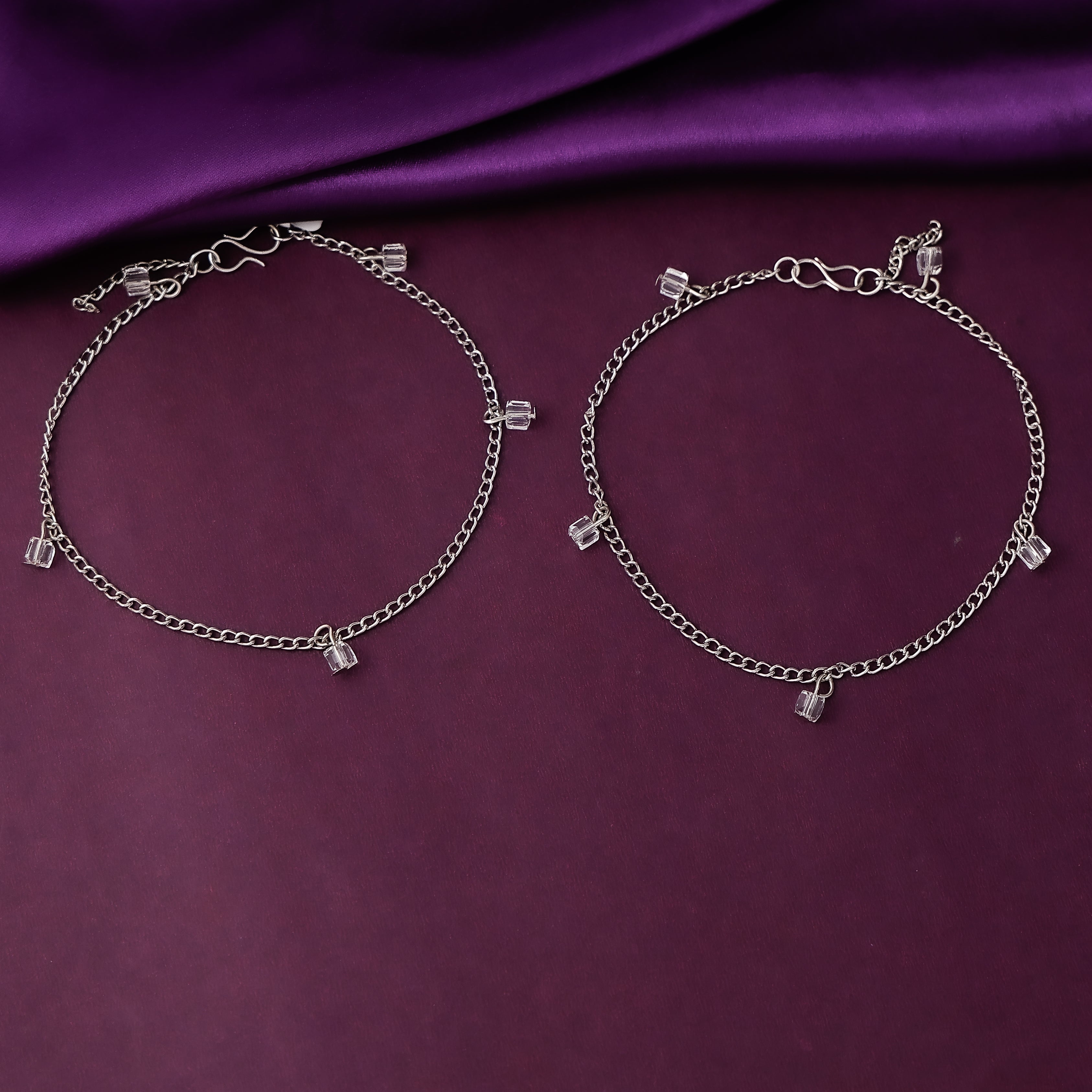 Stylish silver-tone anklet with stone embellishments