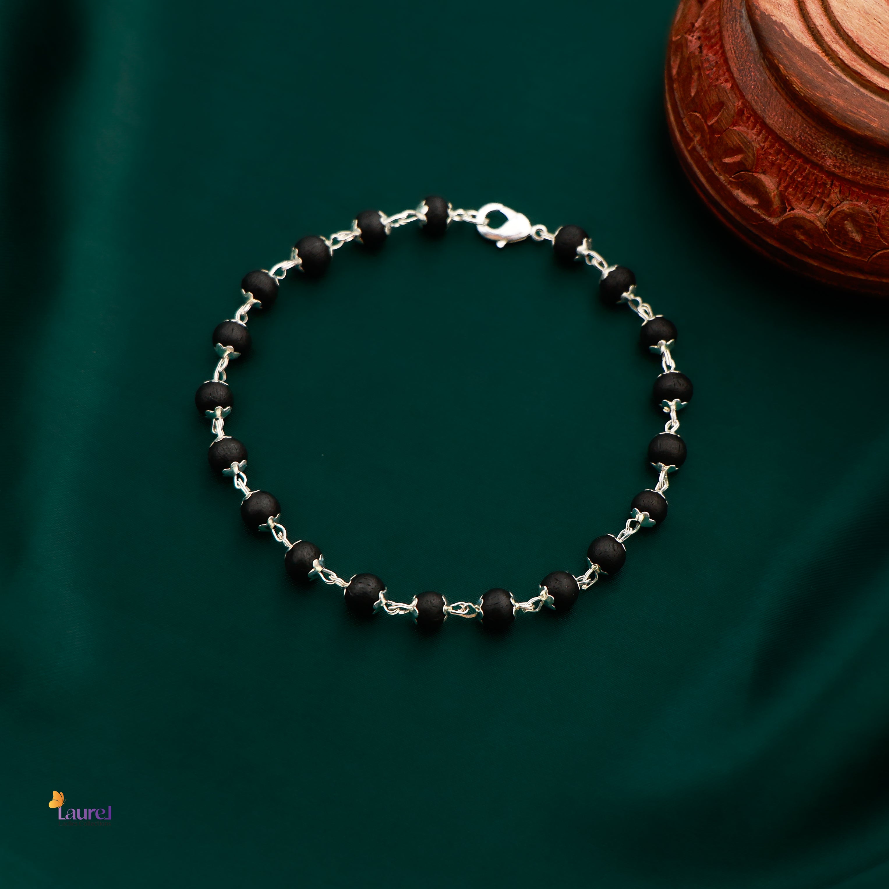 Traditional Karungali bead bracelet with ebony wood finish
