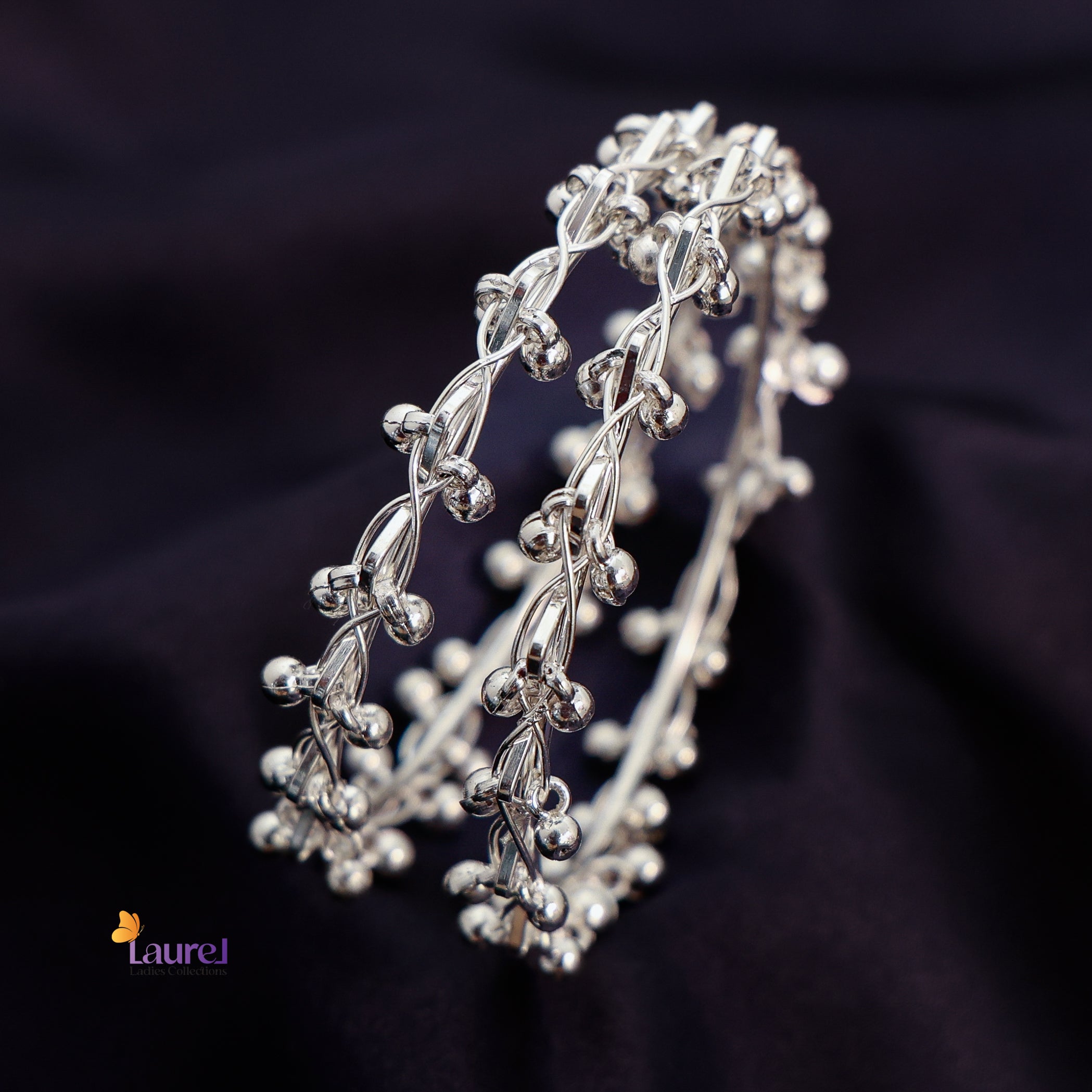 Bridal silver ghungroo bangles with ethnic design