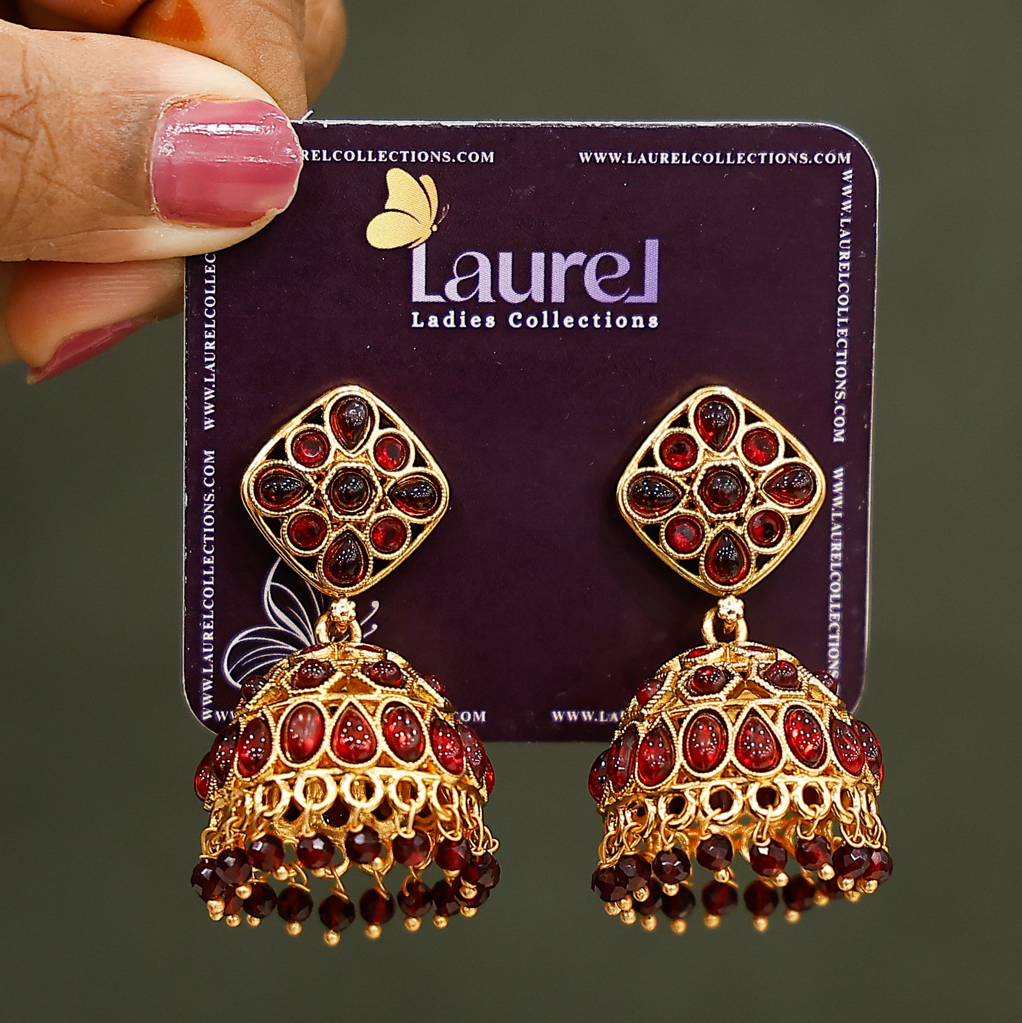 Stylish pink leaf pattern earrings close-up