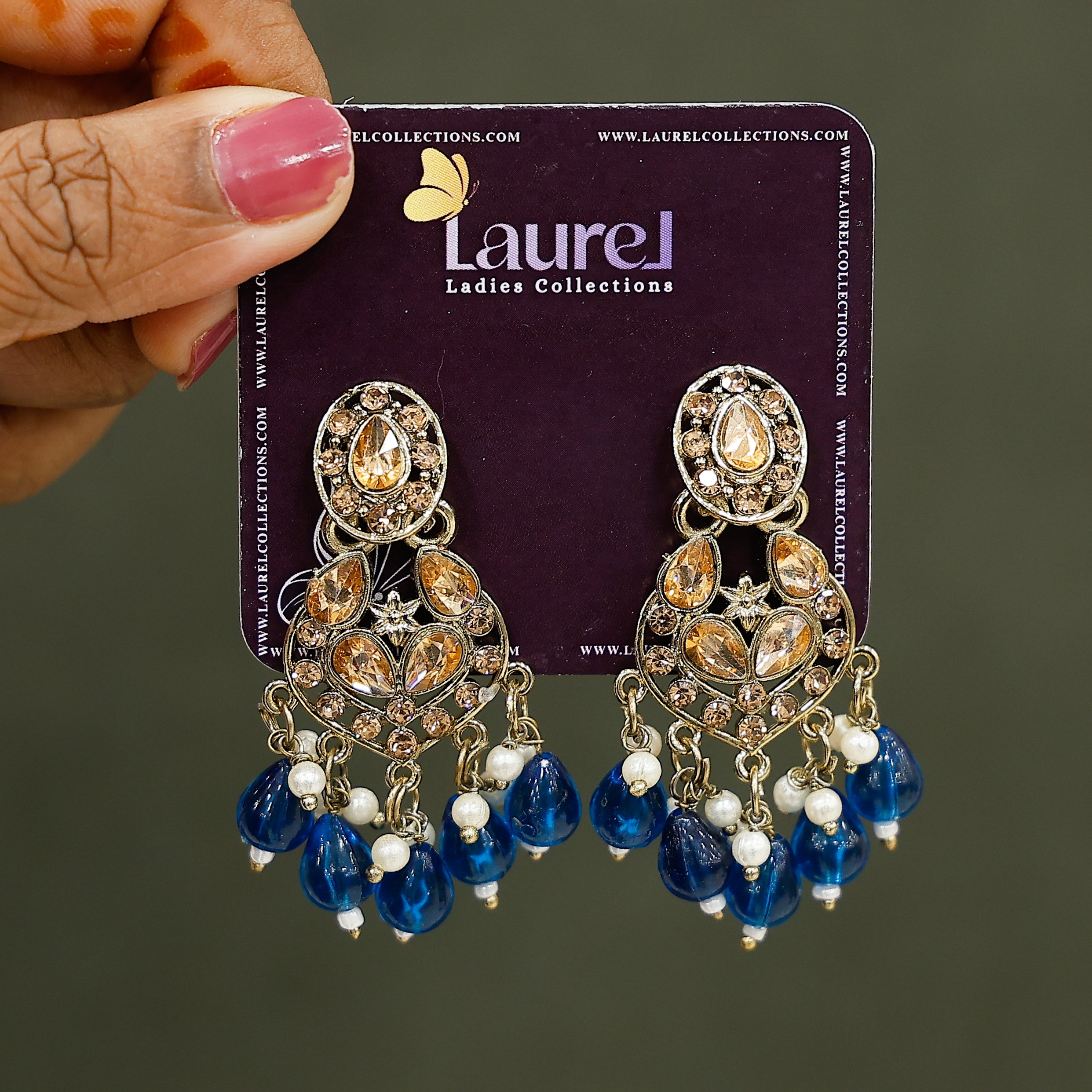 Peacock-inspired blue earrings for festive outfits