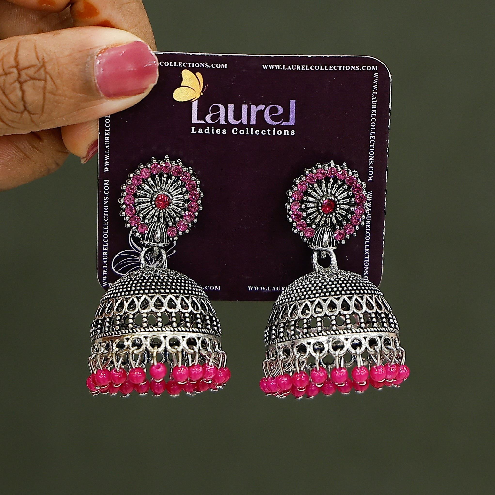 Stylish pink oxidised jhumka earrings for festive wear