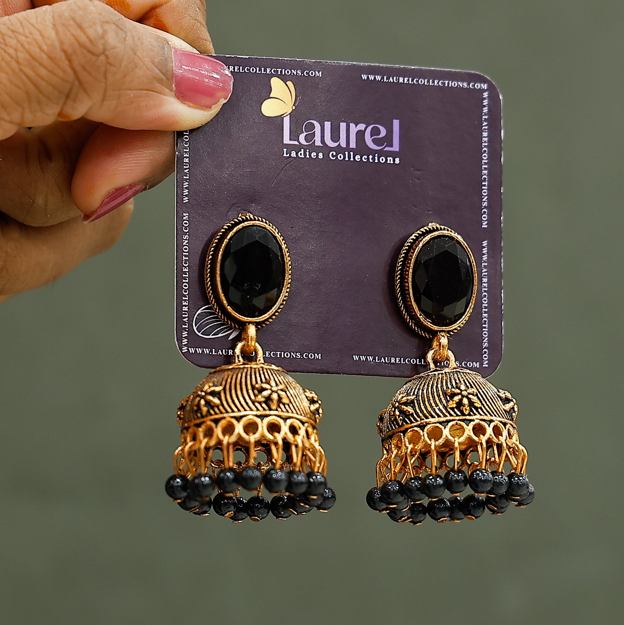 Golden black pearl jhumkas for traditional ethnic styling