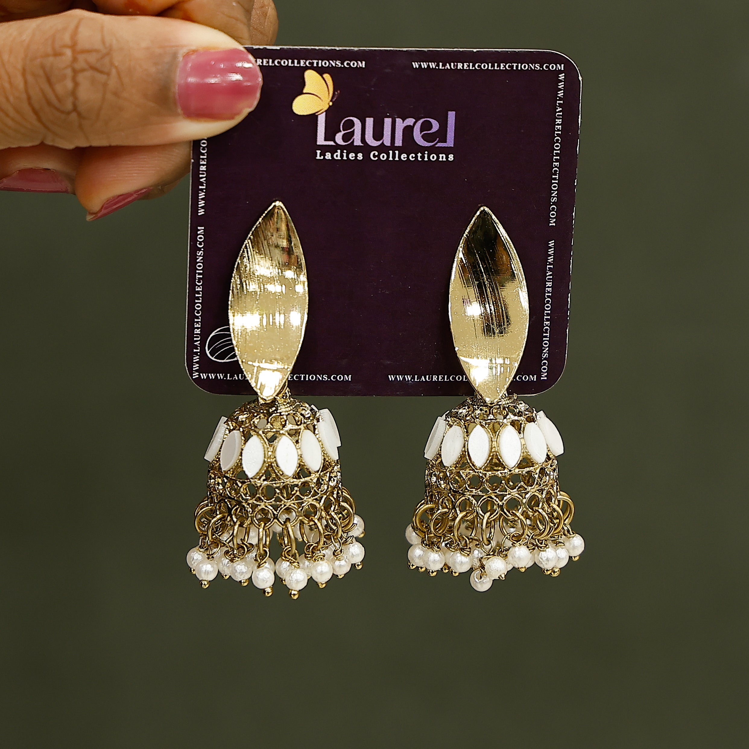 Elegant pearl jhumka earrings in golden finish