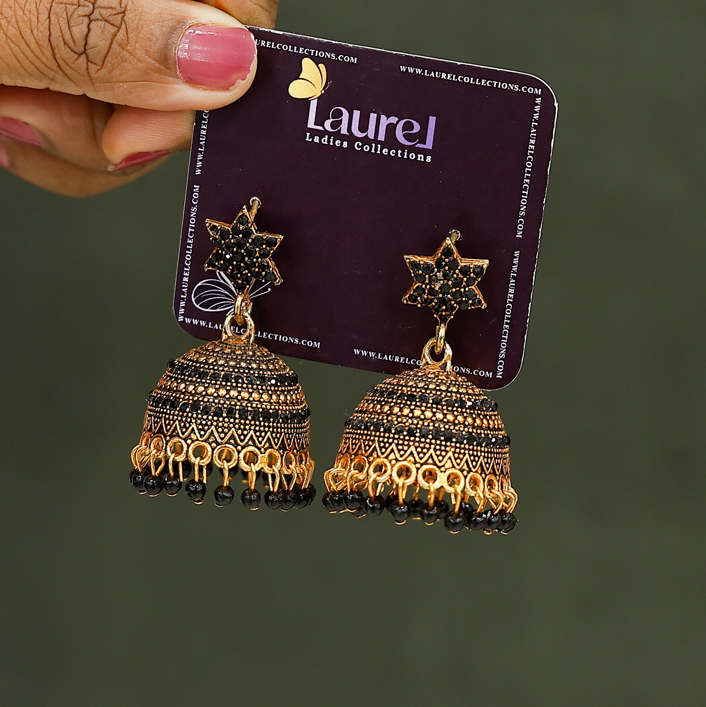 Traditional black bead jhumka earrings with golden finish