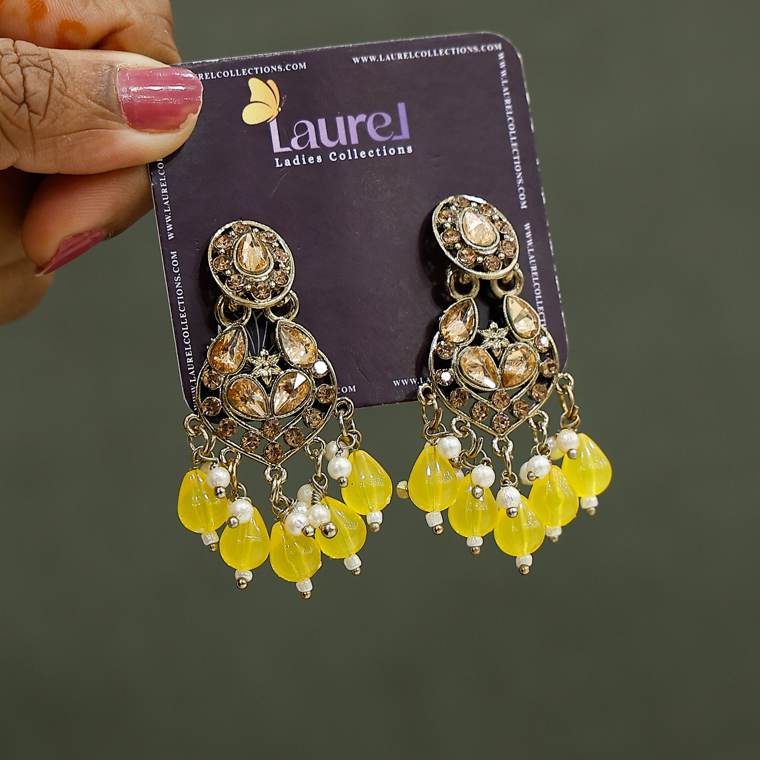 Stylish yellow dangler earrings for women