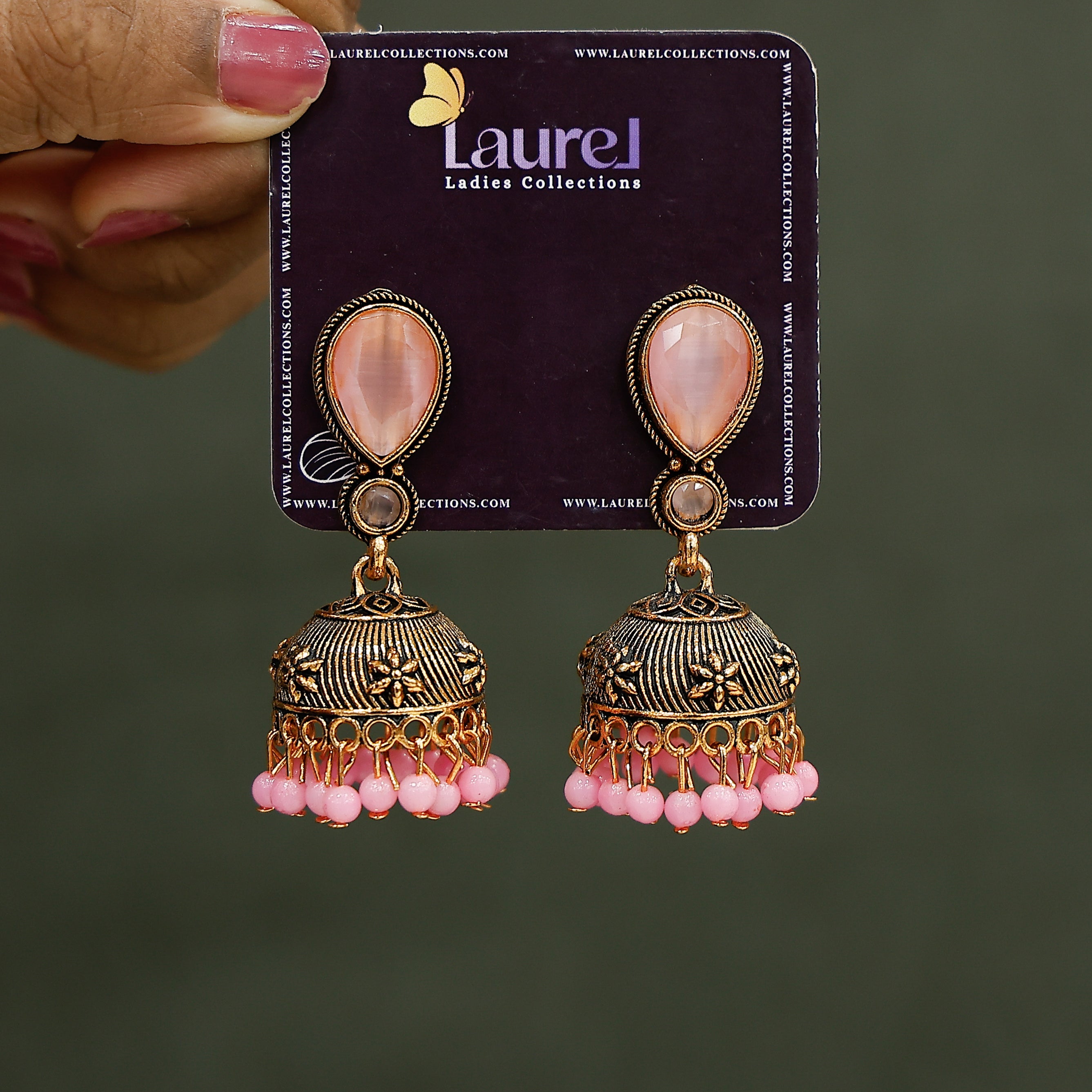 Ethnic Indian jhumkas with pink stones and pearl detailing