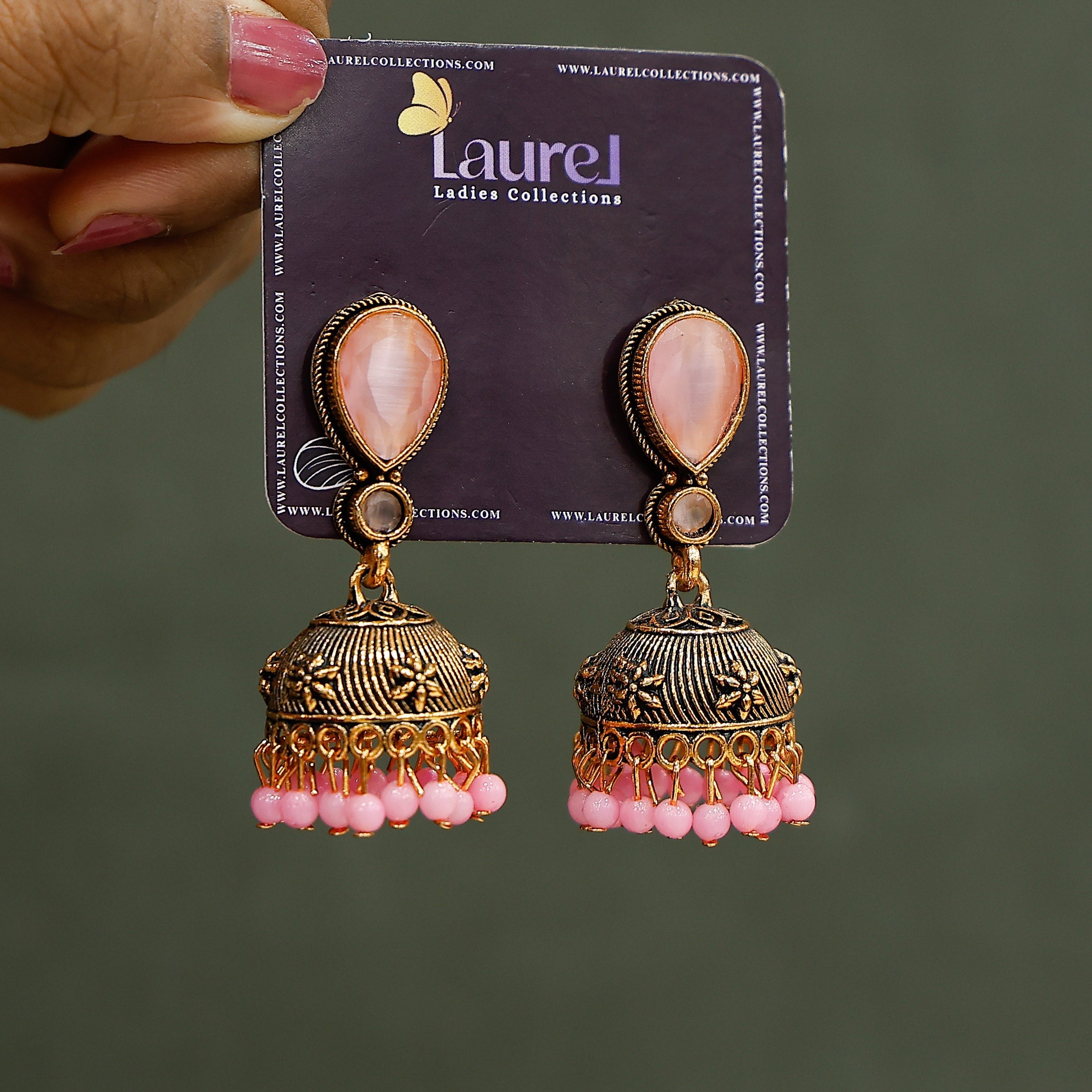 Traditional Indian jewelry earrings with pink stones and pearls