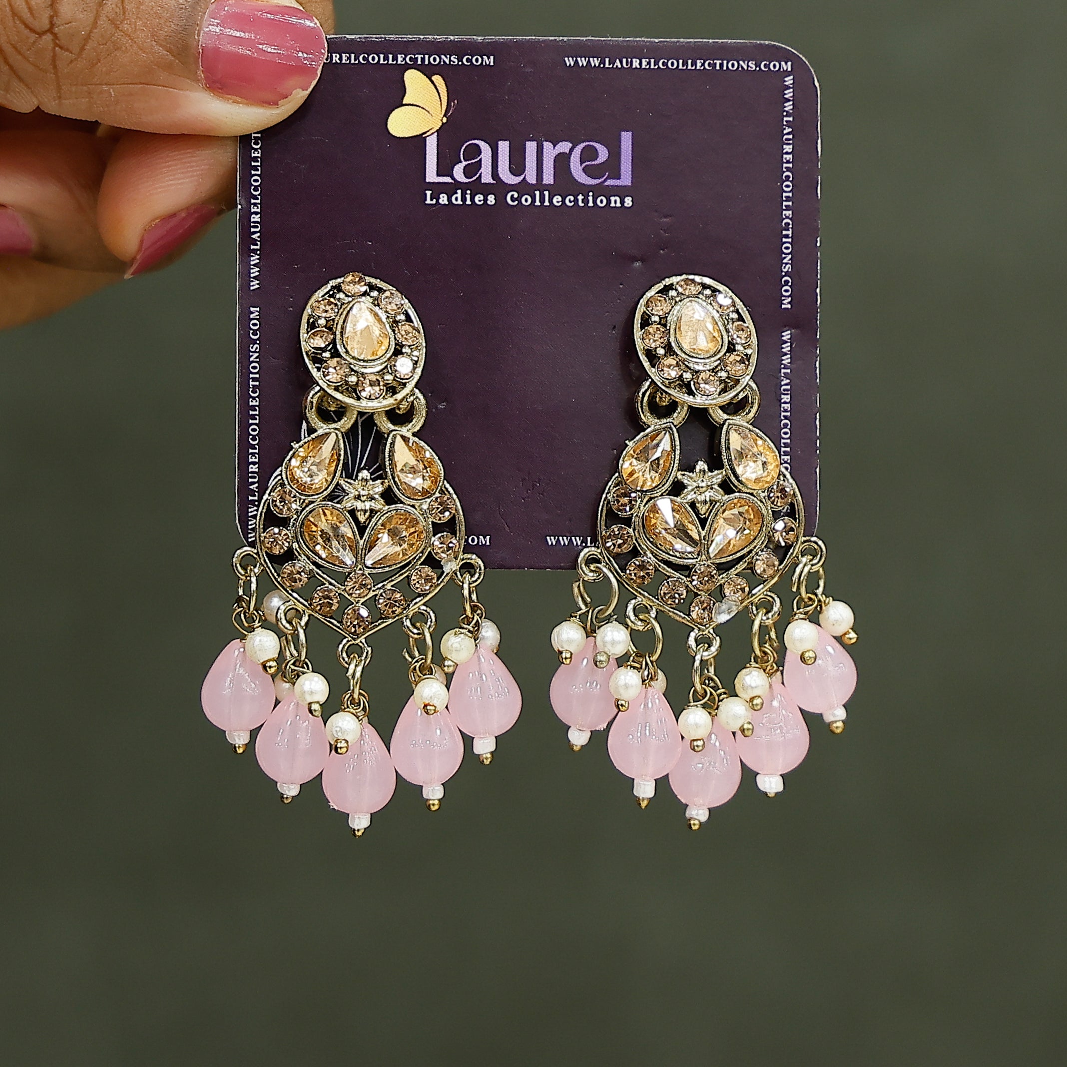 Elegant pink party wear dangler earrings close-up