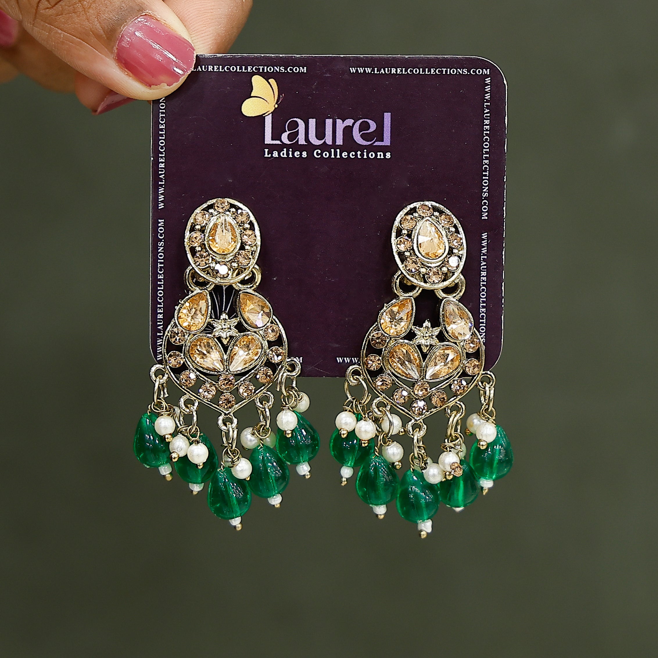 Elegant green party wear dangler earrings close-up