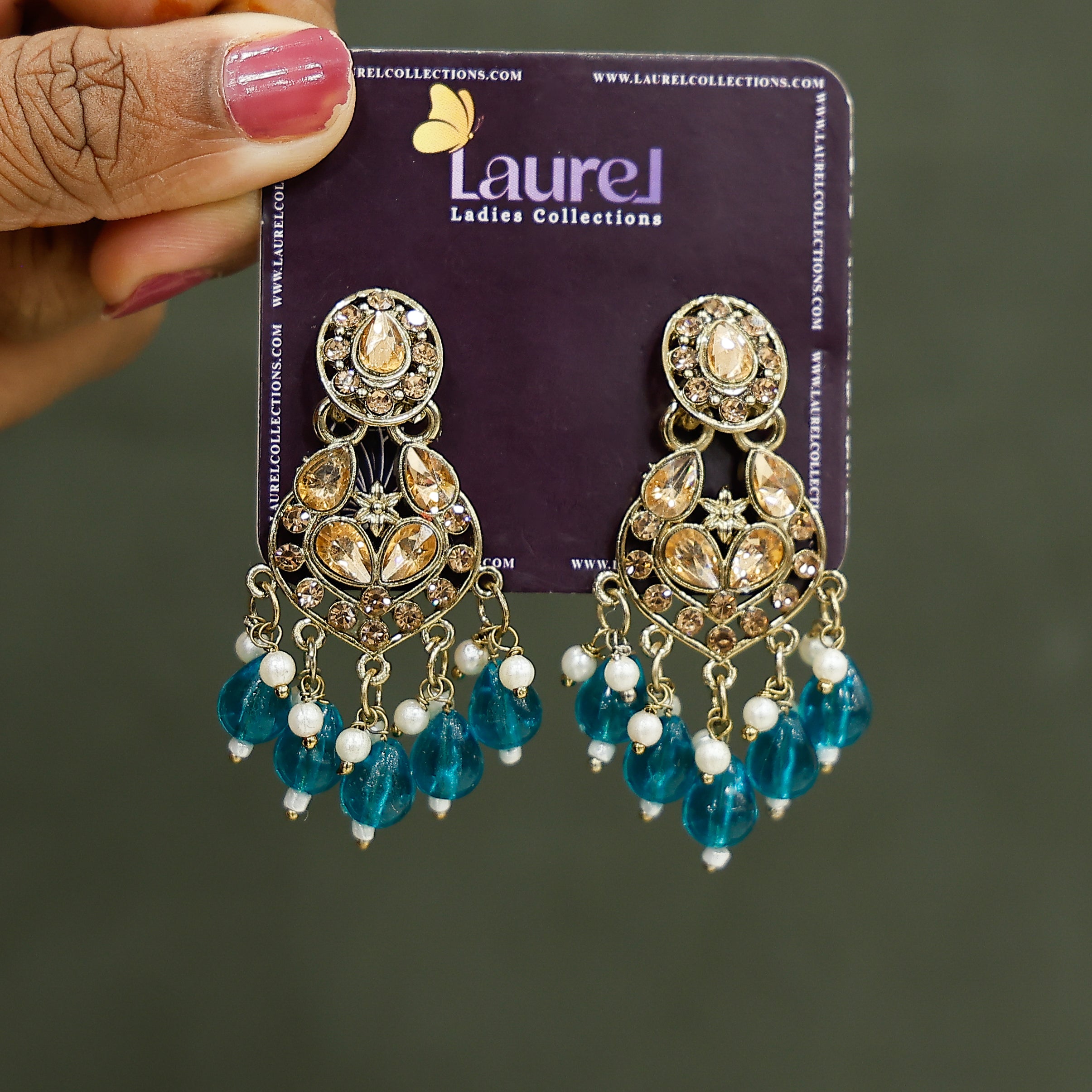 Elegant bead dangling earrings close-up view