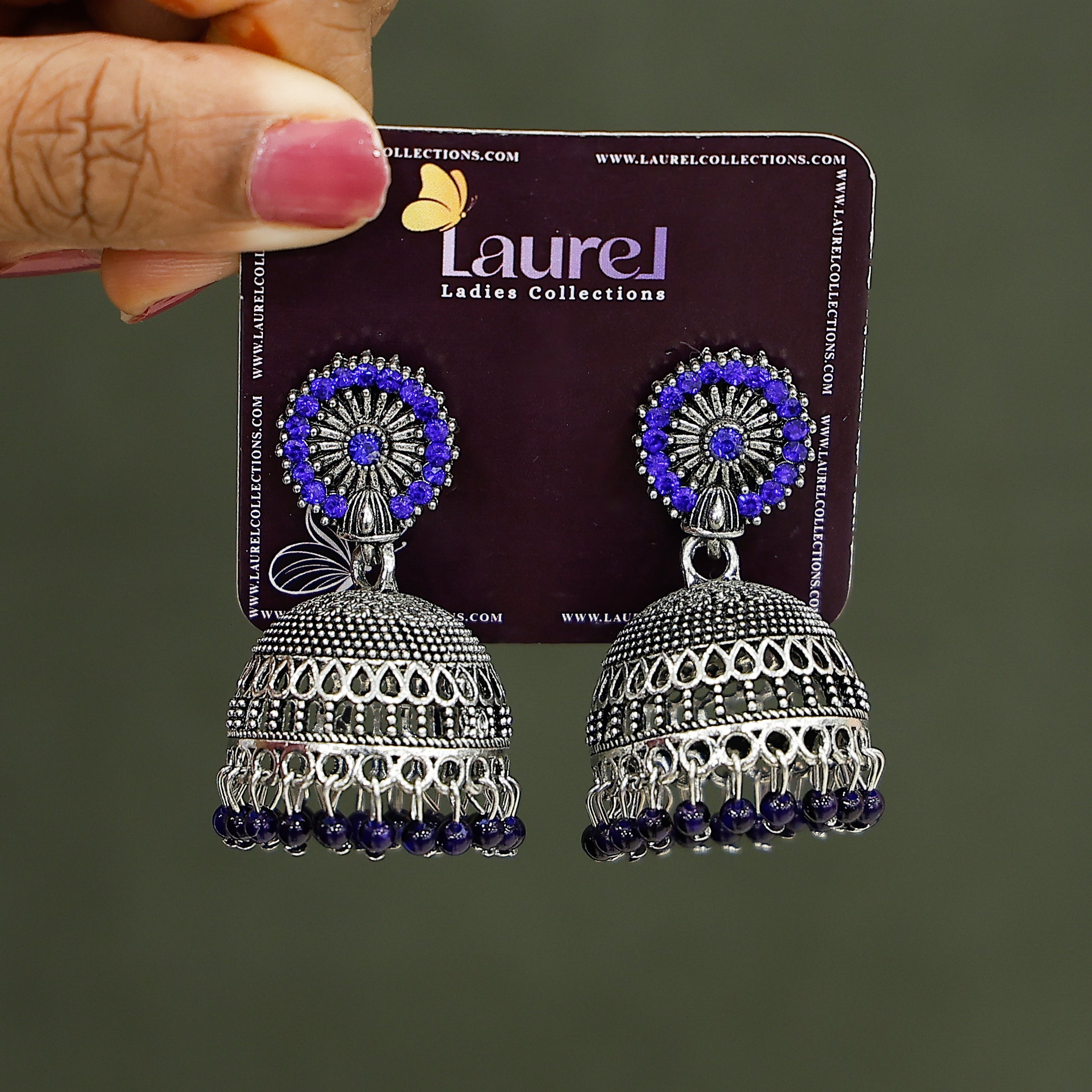 Traditional oxidised silver jhumkas with royal blue stones