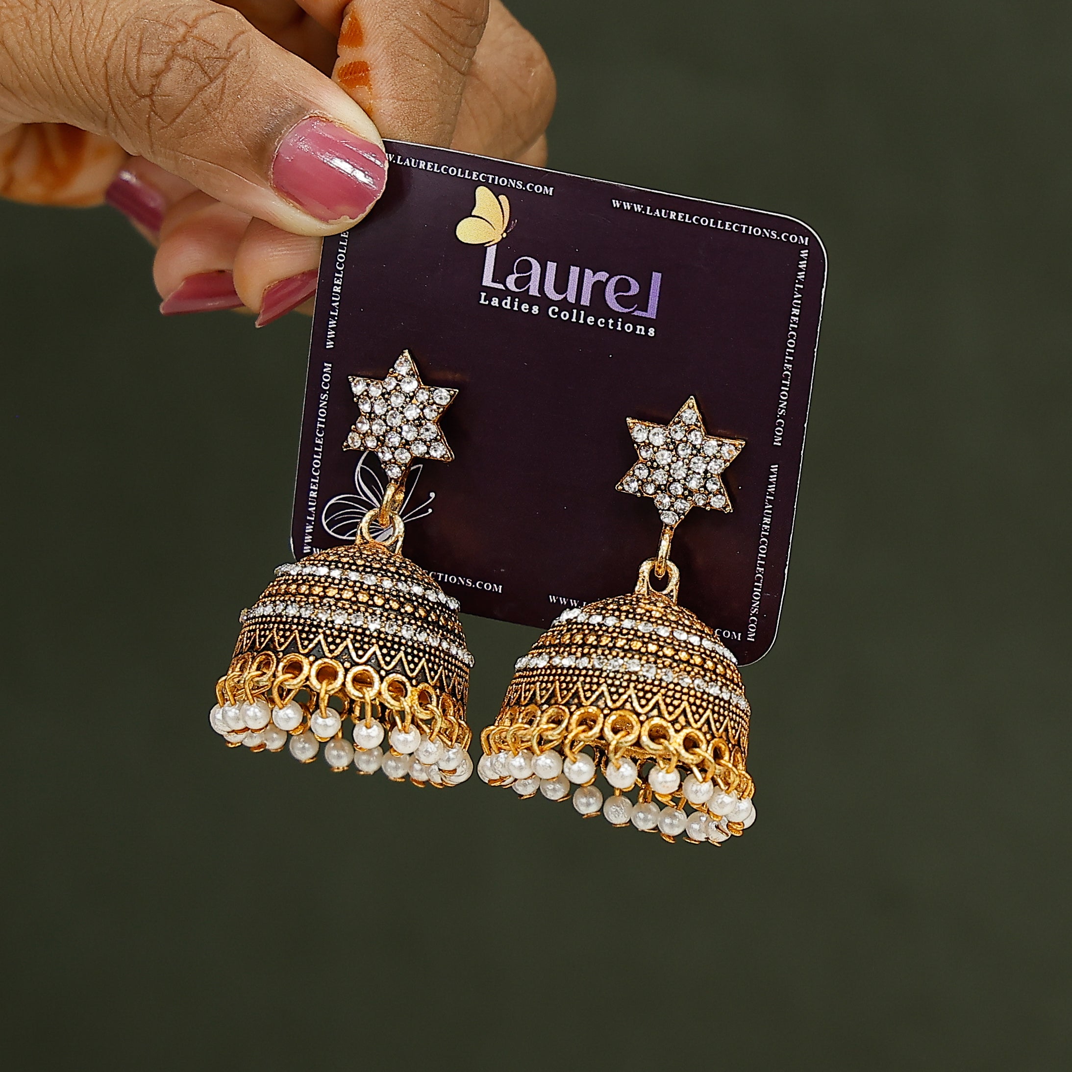 Traditional star-shaped jhumka earrings with festive design