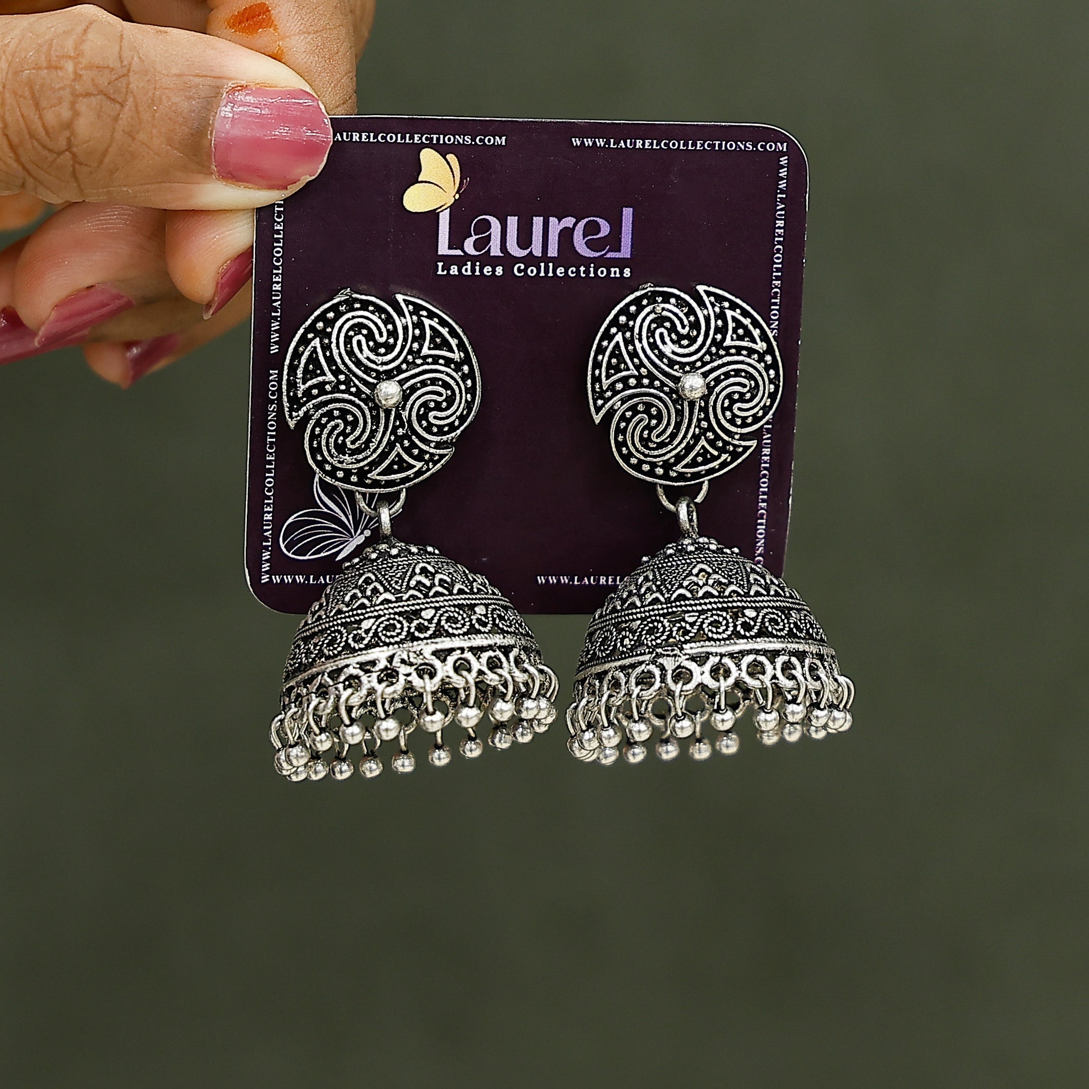 Traditional oxidised jhumka earrings with pearl detailing
