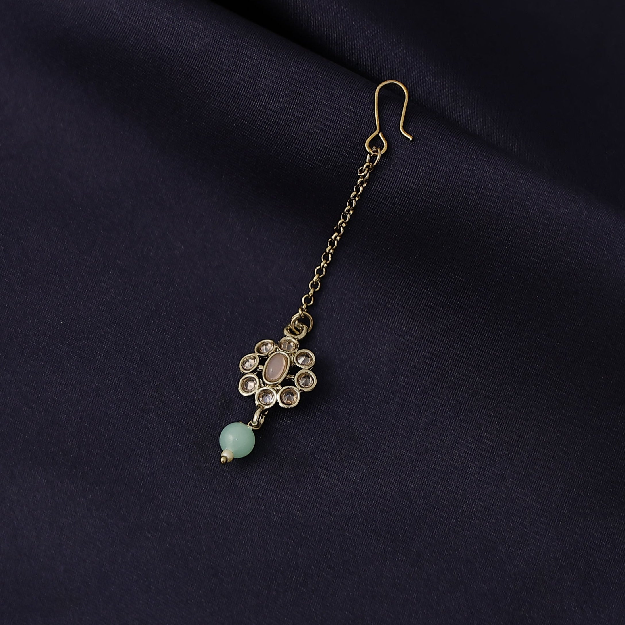 Floral pendant chutti paired with South Indian bridal attire