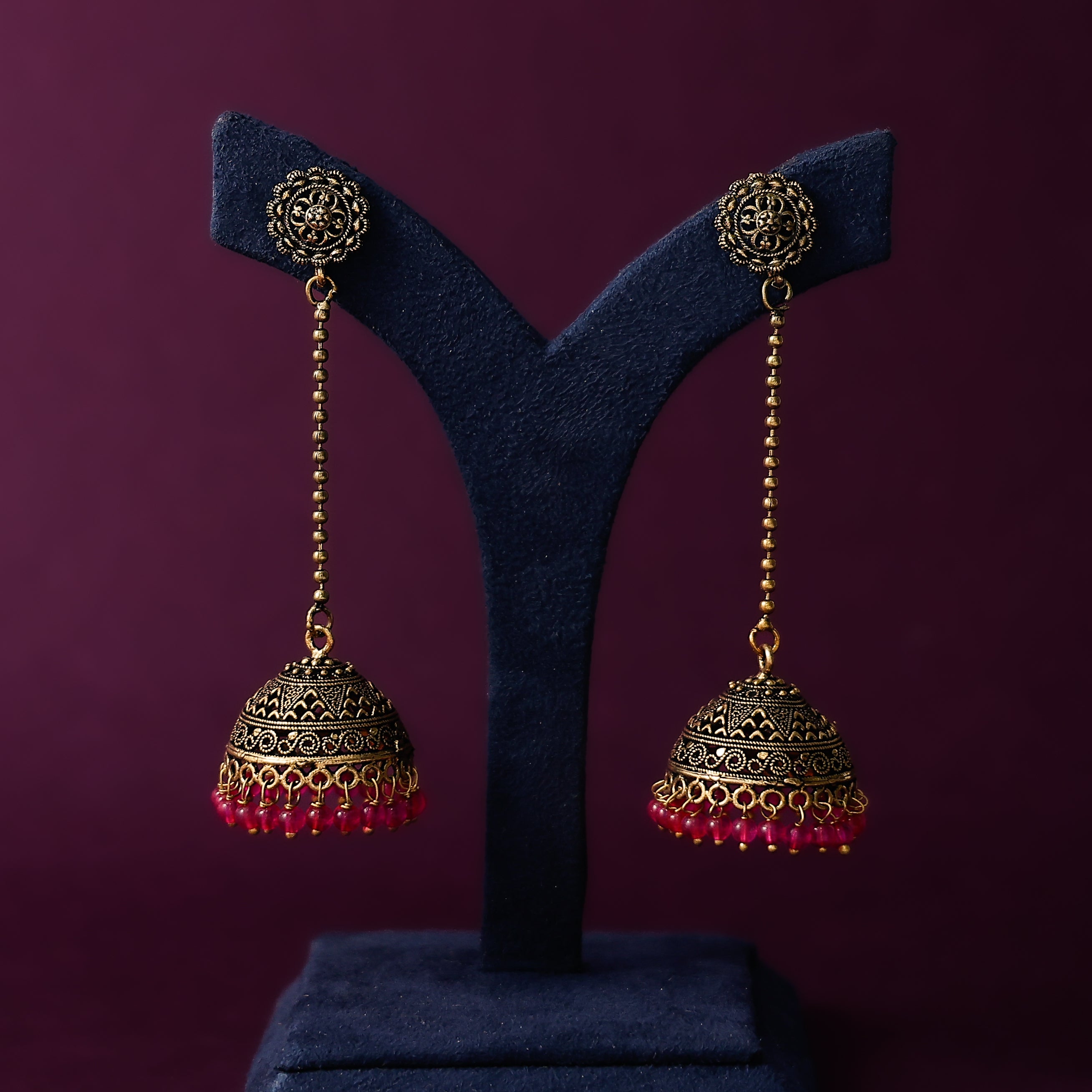 Ethnic gold-plated big jhumka earrings for festive wear
