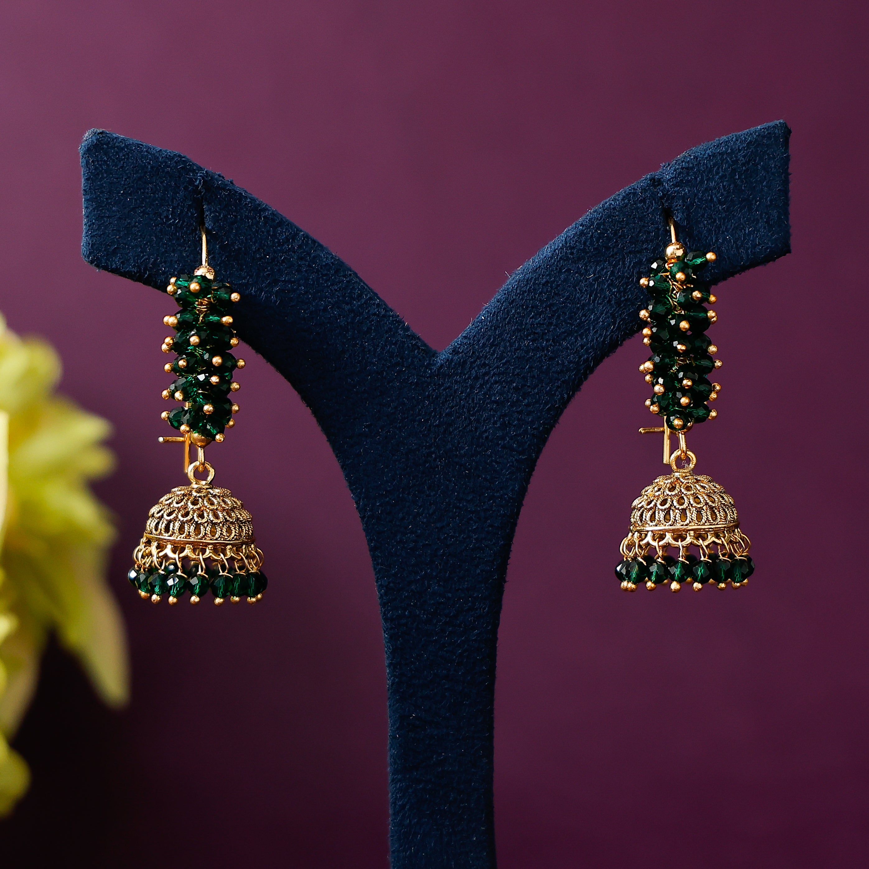Traditional gold-tone jhumka earrings with pearl cluster drops