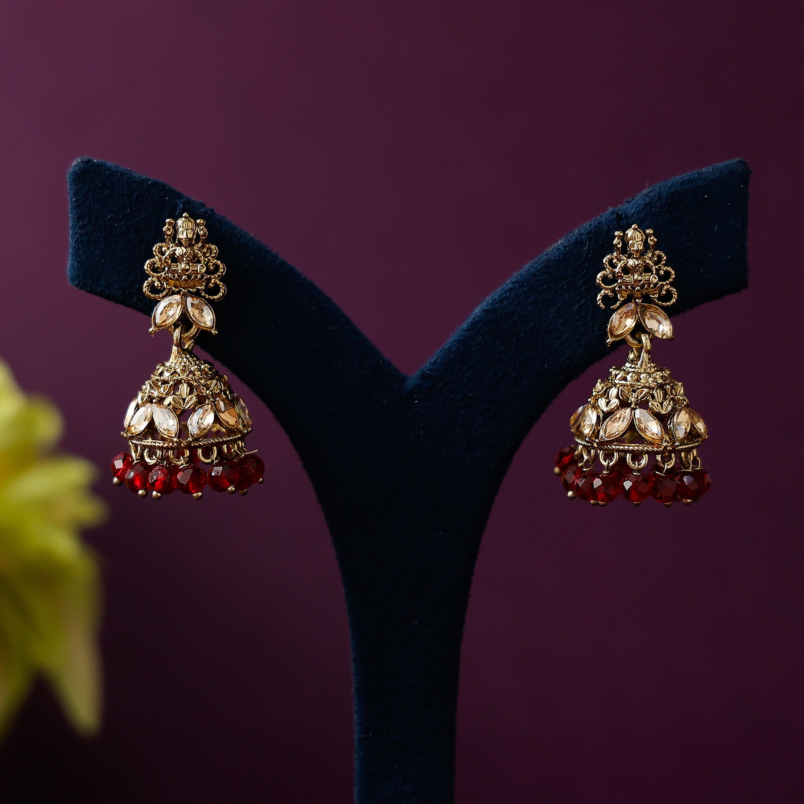 Traditional temple jhumka earrings with stone and bead accents