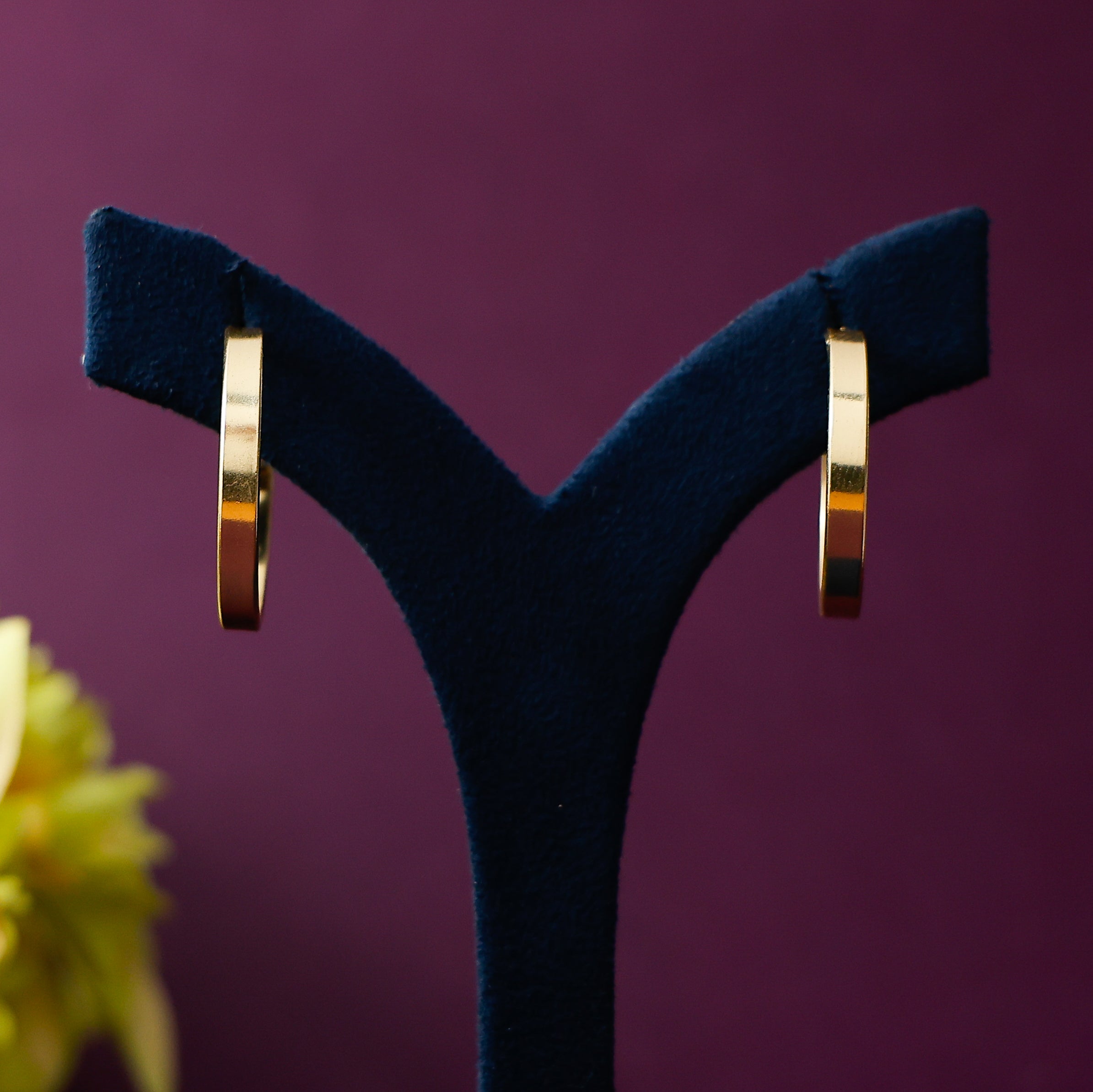 Minimal gold-tone rounded hoops for daily wear styling