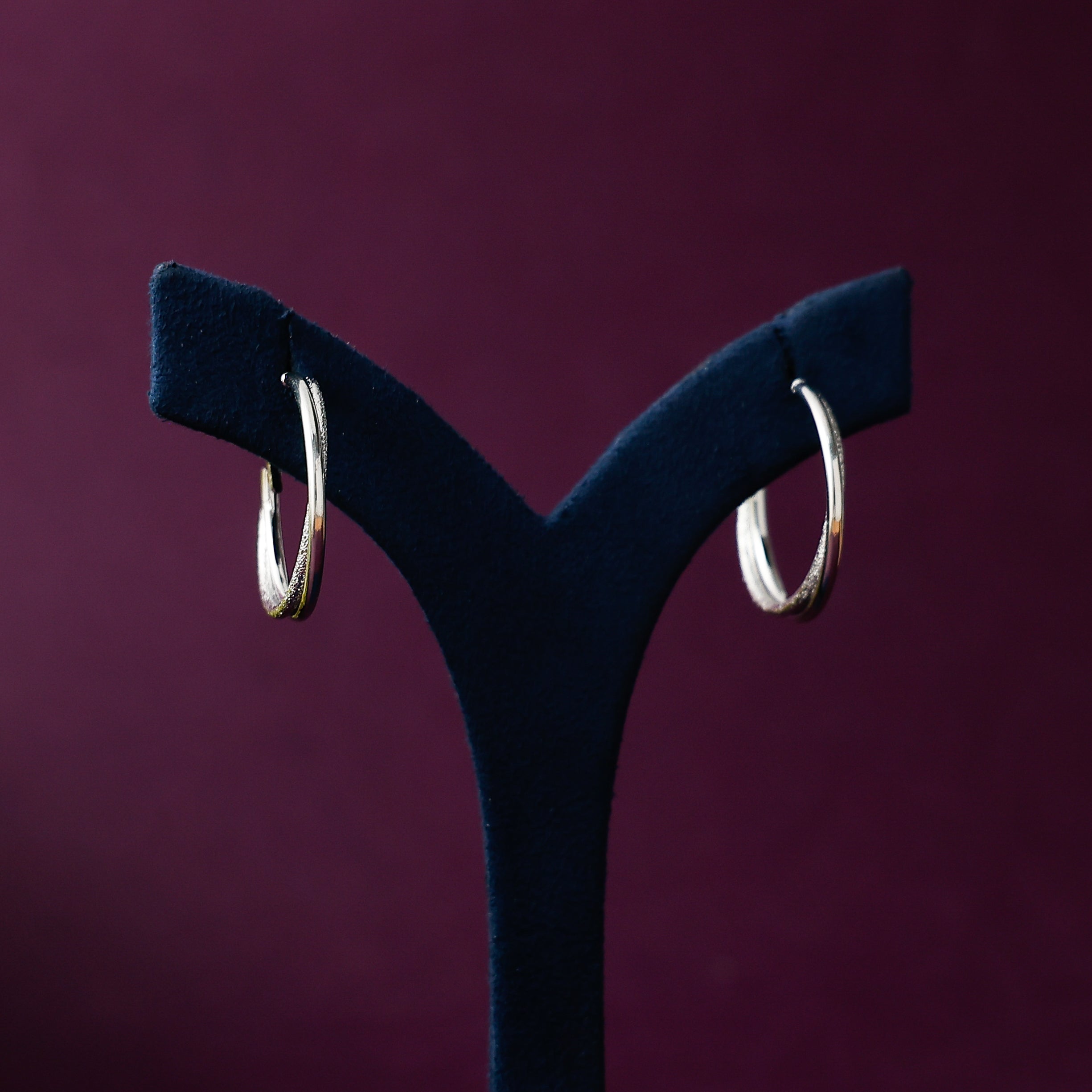 Silver Textured Crossed Hoops